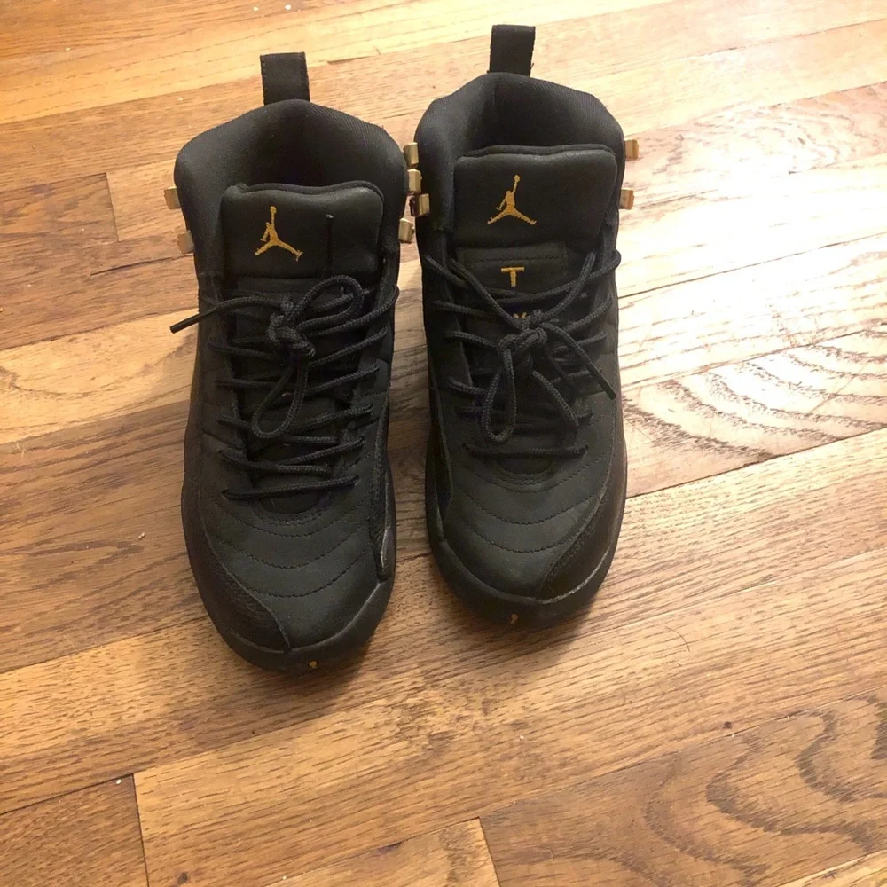 Jordan Men’s Black and Gold High-Top Sneakers